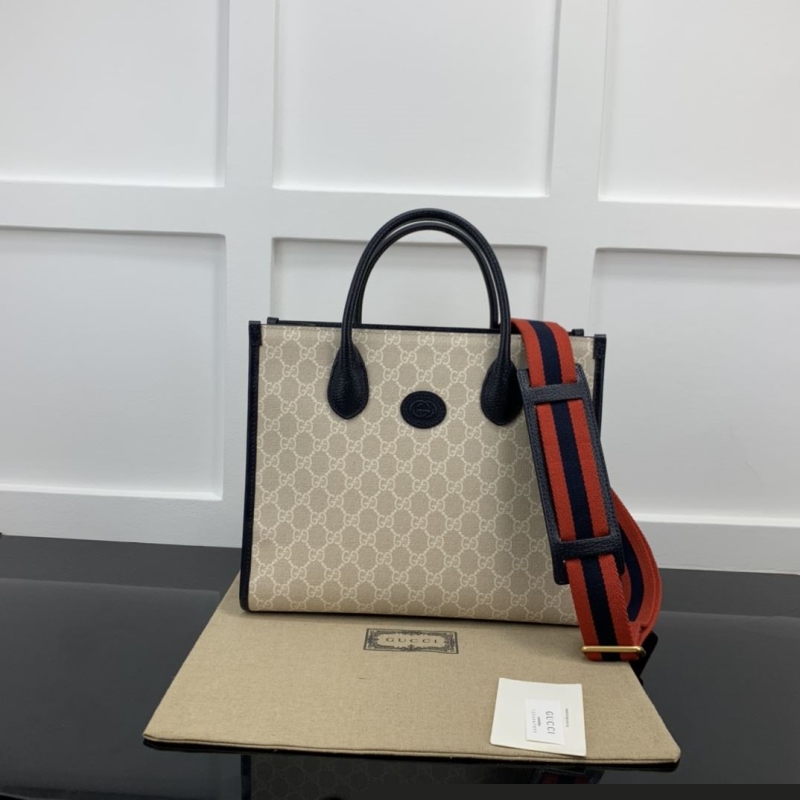 G*u*i shopping bags